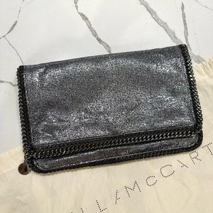 Stella McCartney fold over silver glitter clutch